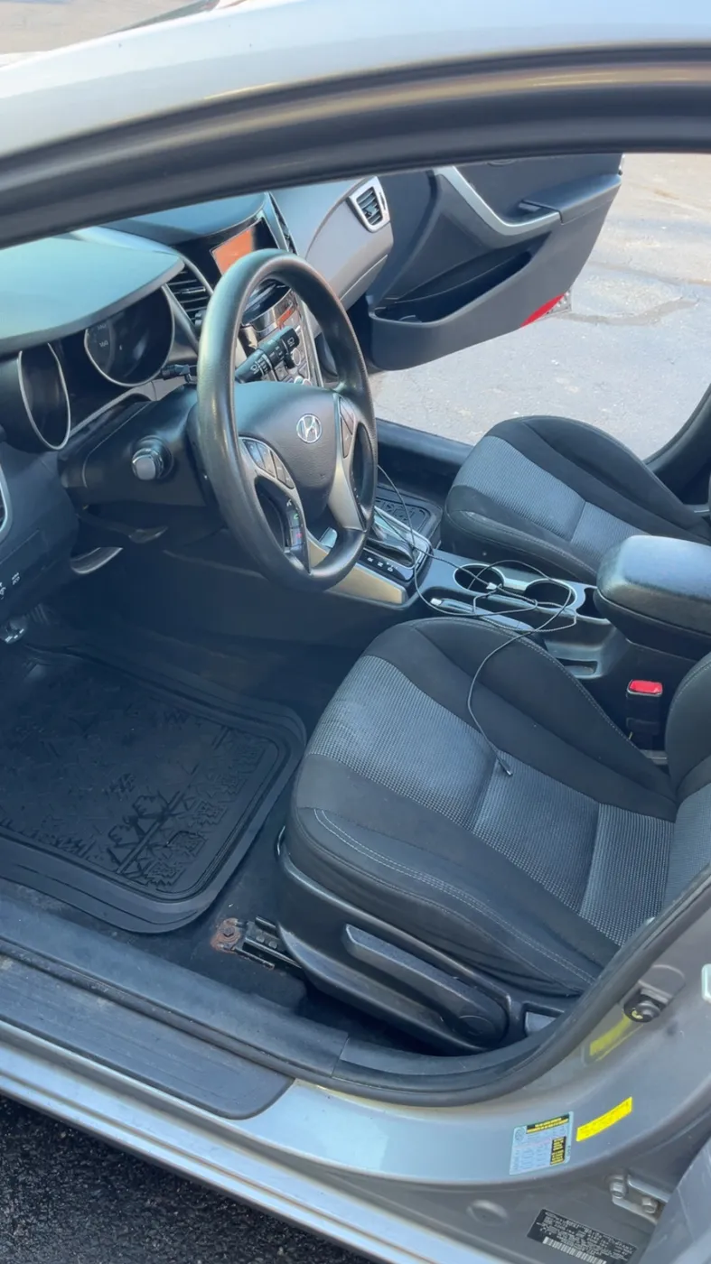 Driver seat & floor mat after detailing at Hi-Tech Auto Sales