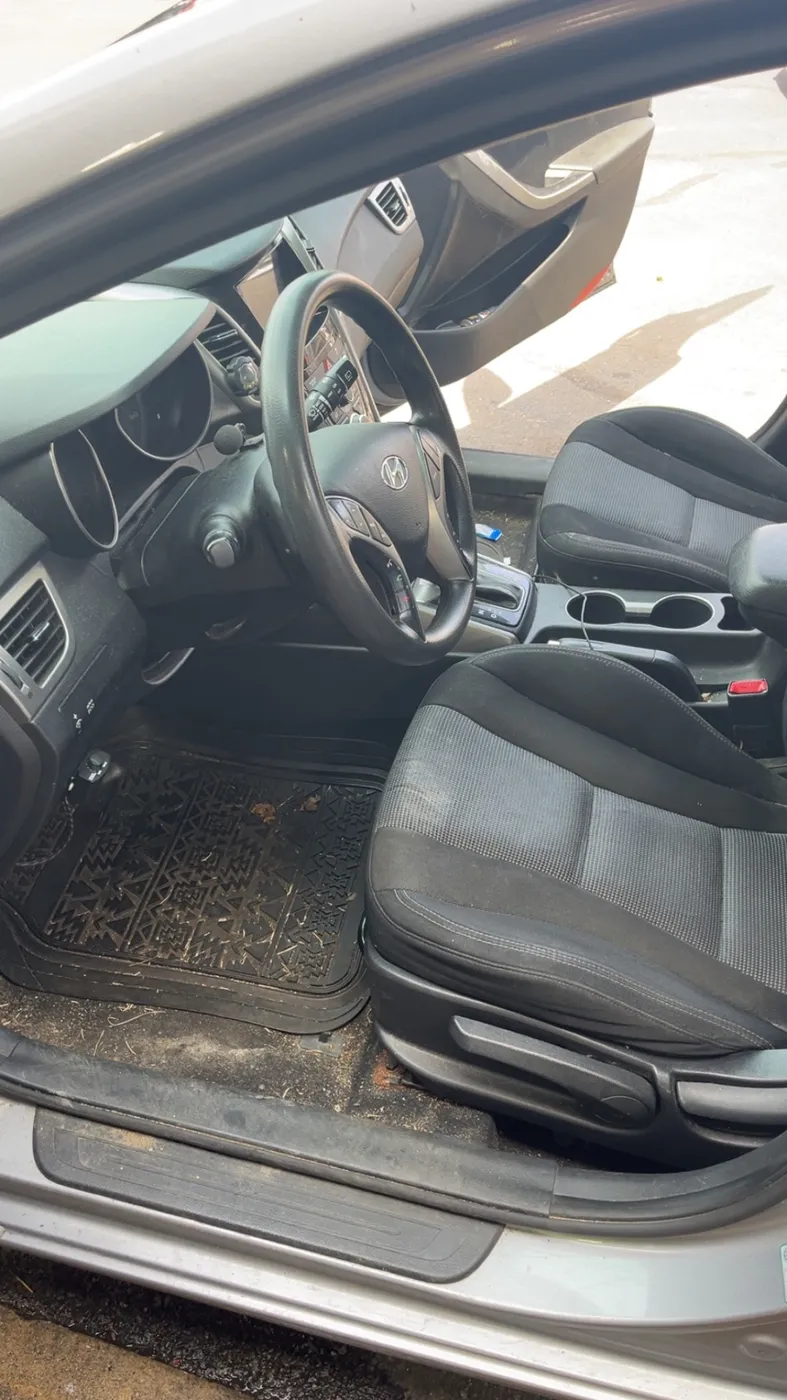 Driver seat & floor mat before detailing