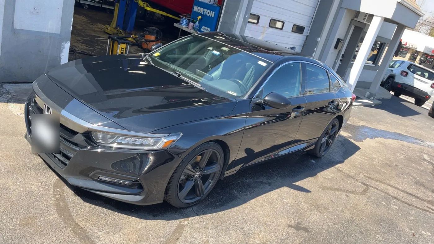 Black Honda Accord after an exterior detail at Hi-Tech Auto Sales in Providence